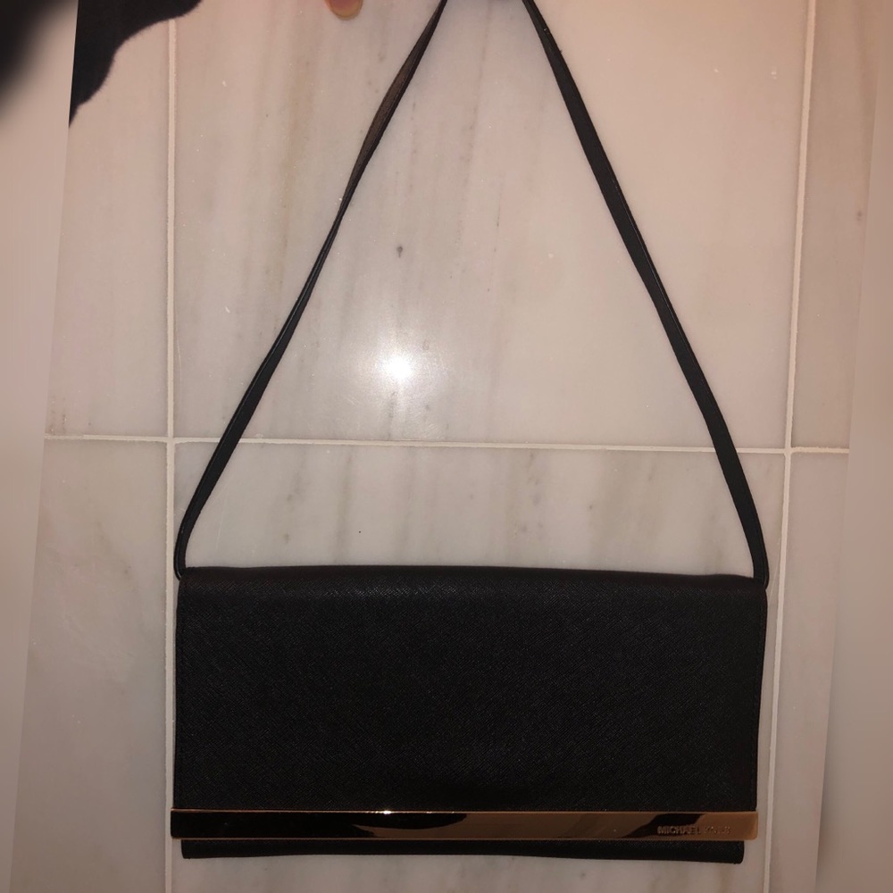 Micheal Kors Clutch Bag. Black/Gold.